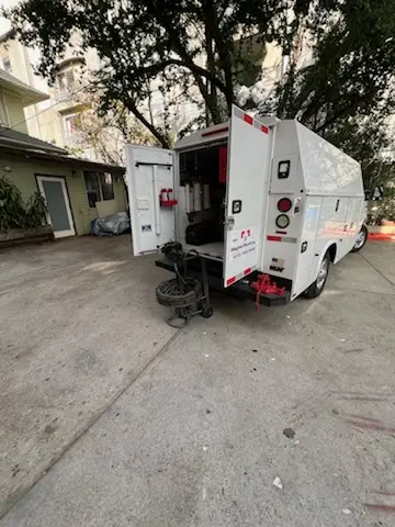 Magnet Plumbing service vehicle on-site for Grease Trap Cleaning in Belleview